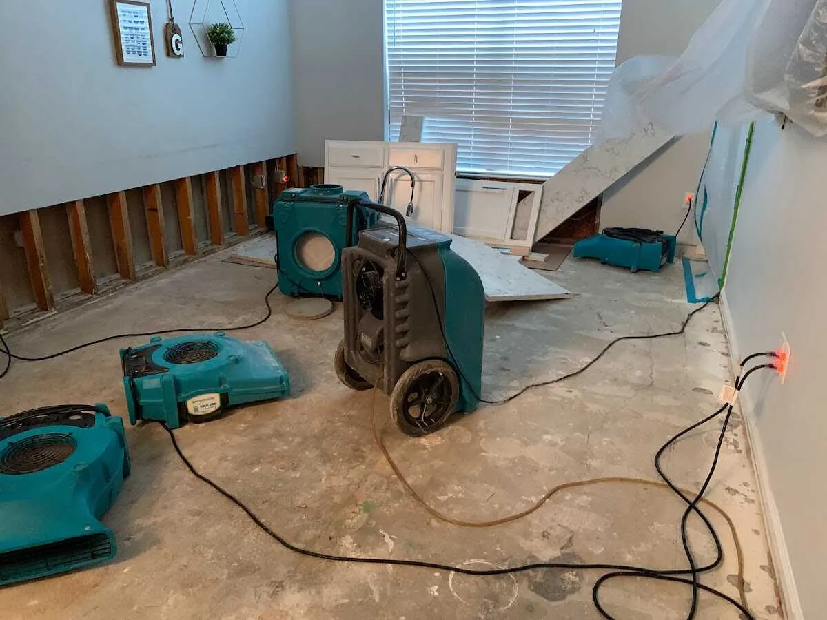 Dehumidifier in flood-cut room for Water Damage Restoration in Coachella